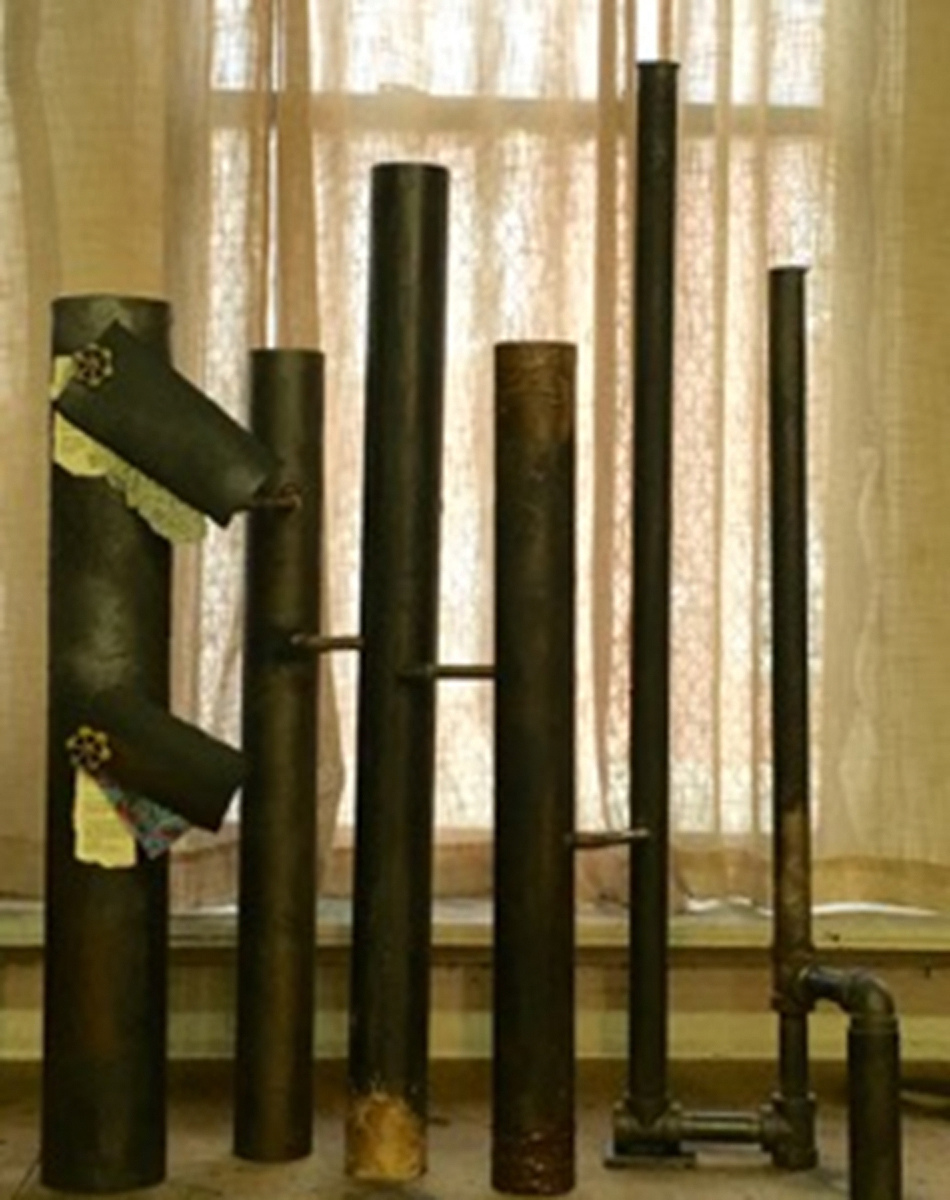 Judith Serling-Sturm, Ruins of Justice - Flint, Feb-16. Mixed Media, 48 x 38 x 12 inches. Courtesy of Lloyd Library and Museum